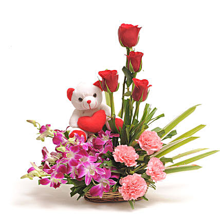 Sweet Inspiration - Basket arrangement of Orchids, carnations, roses & Cute Soft toy.