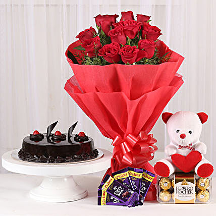 Some One Special - Bunch of 12 Red Roses with 5 cadbury chocolates, Soft toy, Ferrero Rocher and 500gm Chocolate Cake.:Cakes and Chocolates