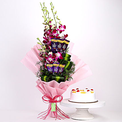 Online Dairy Milk Orchids Bouquet And Pine Apple Cake