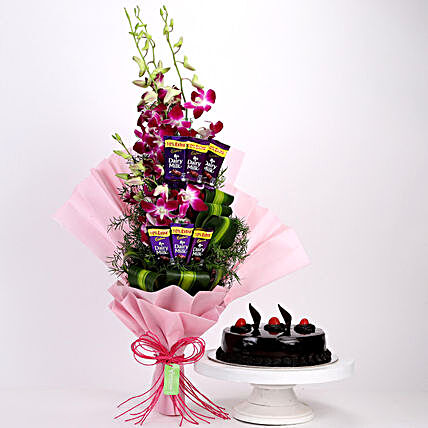 Online Dairy Milk Orchids Bouquet And Truffle Cake:Cakes and Chocolates