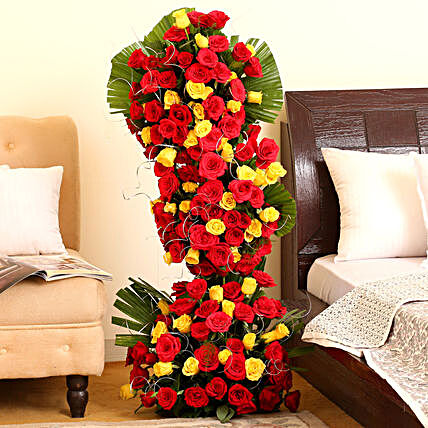 Endless Love - 3-4 ft high arrangement of 100 red and yellow roses.