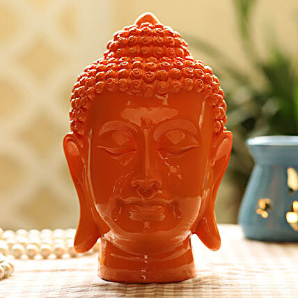 orange colour buddha idol:Buddha Gifts