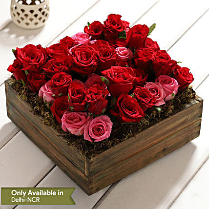 flower in wooden tray arrangement:Flagship Collection