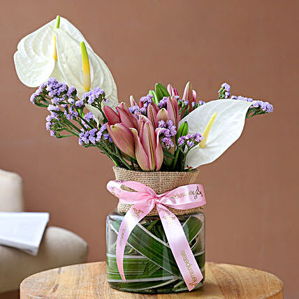 Charming Mixed Flowers In Pink Ribbon Tied Jar:Send Anthuriums