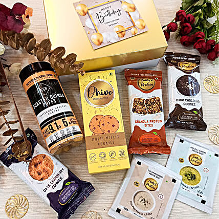 https://www.fnp.com/images/pr/m/v20230822060855/assorted-healthy-snacks-gift-hamper-for-special-occasions.jpg