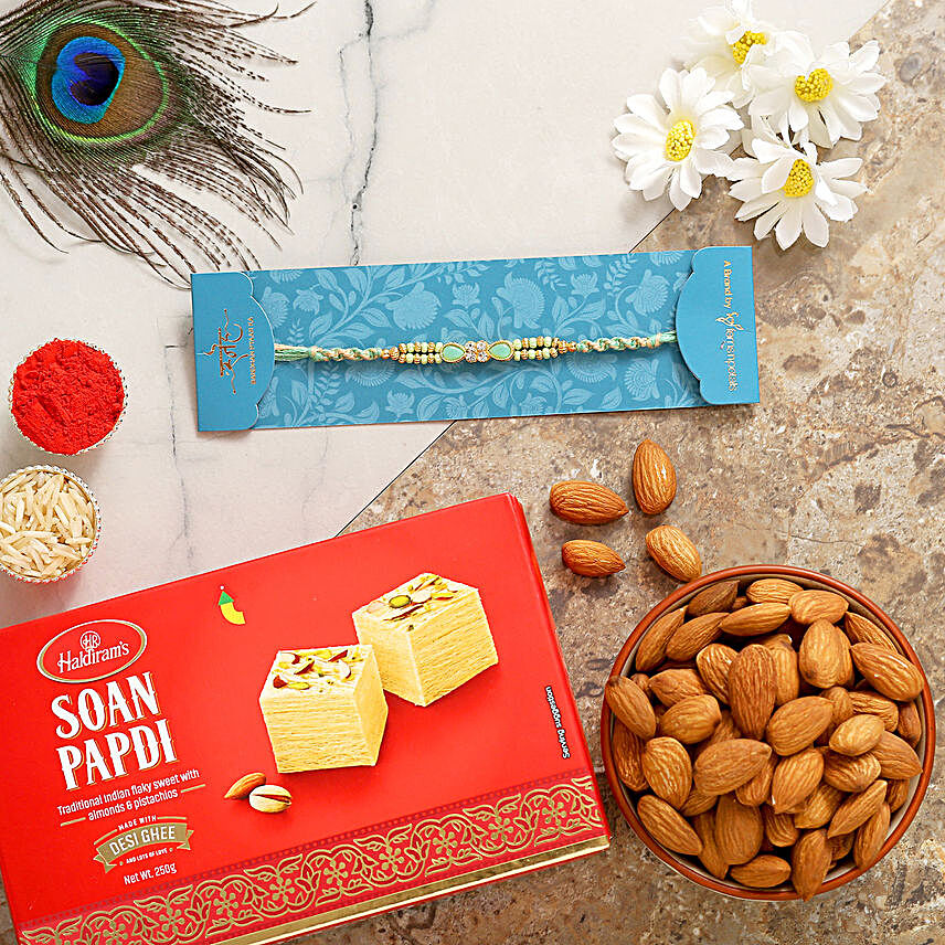 Green Pearl Rakhi With Soanpapdi And Almonds:Rakhi and Sweets to Malaysia