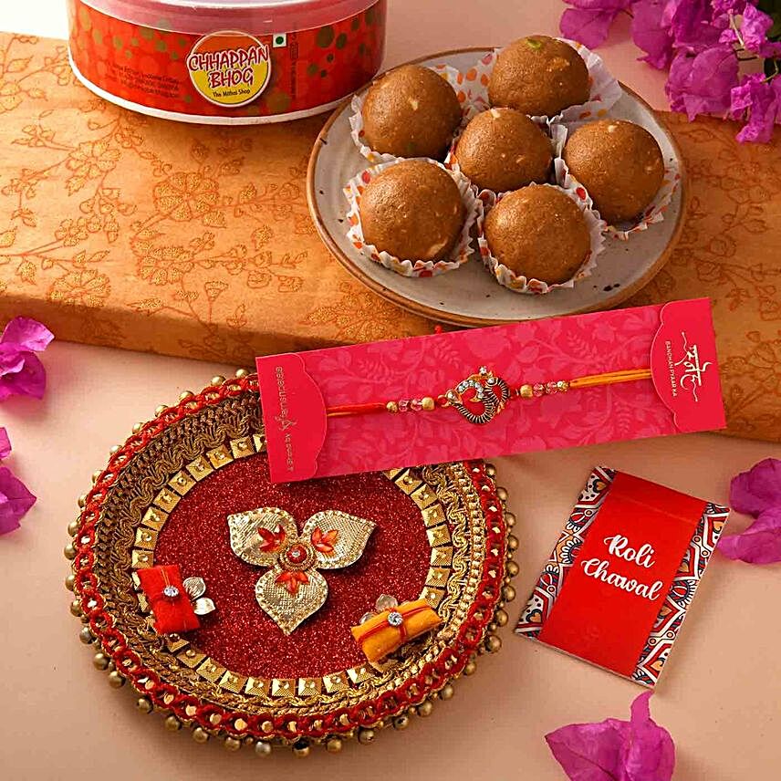 Om Rakhi With Panjiri Laddoo And Pooja Thali:Rakhi with Sweets to Malaysia