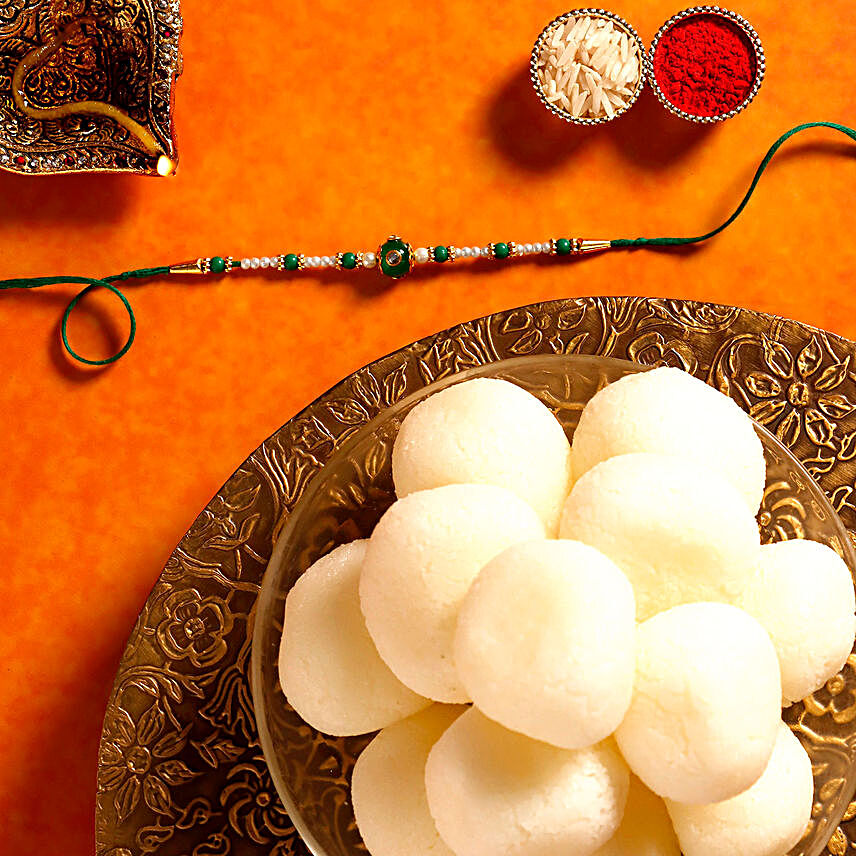 Sneh Fancy Green Rakhi & Rasgullas:Rakhi with Sweets to Malaysia