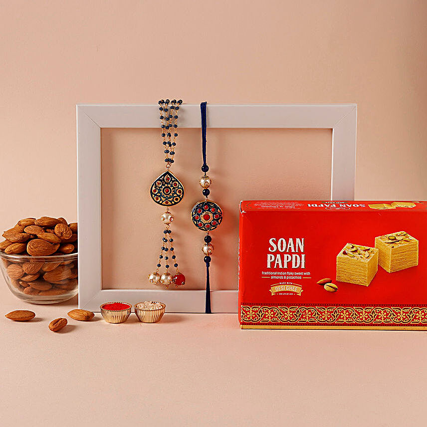 Sneh Traditional Rakhis With Soan Papdi & Almonds:Rakhi and Sweets to Malaysia