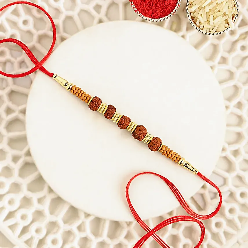 Celestial Charms Rudraksha Rakhi N Almond Soan Papdi Gift Set