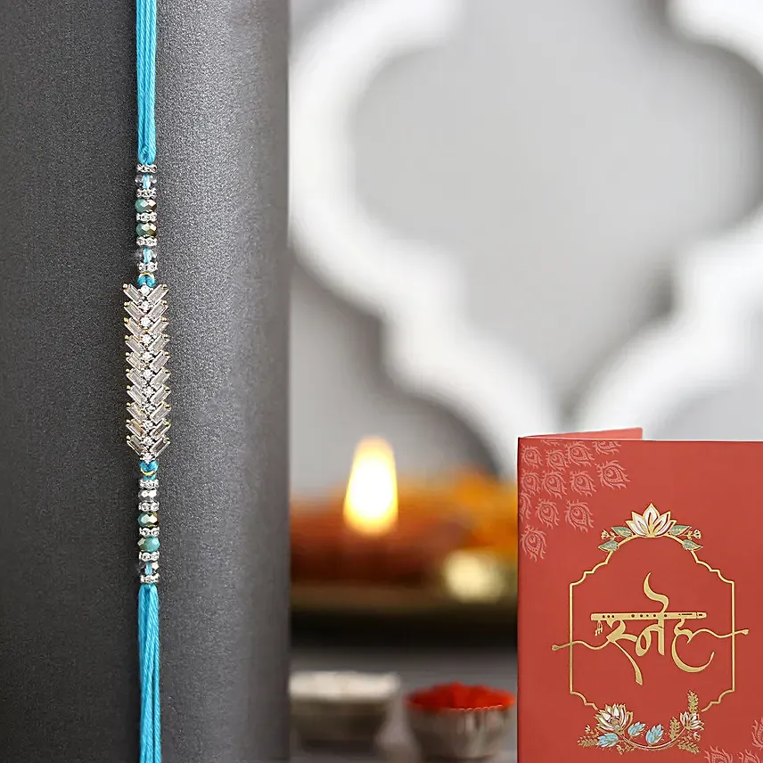 Glittering Grandeur Rakhi Set N sweets Collection