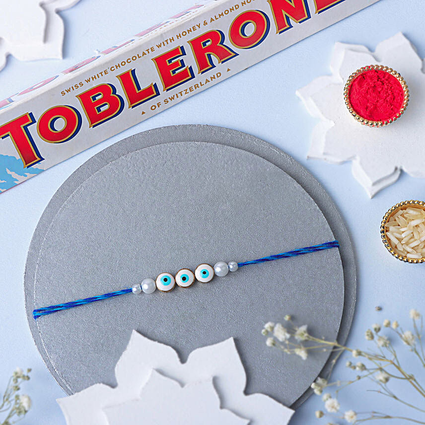 Simplistic Blue Evil  Eye Rakhi N Toblerone Delight