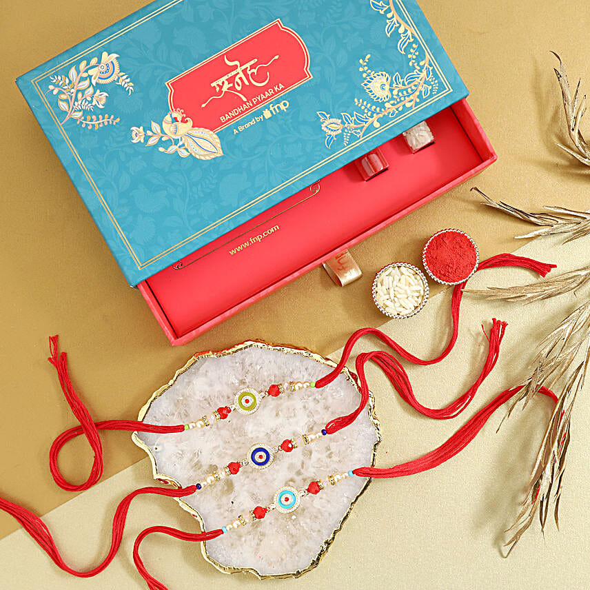 Sneh Evil Eye Rakhi Set N Haldiram Soan Papdi