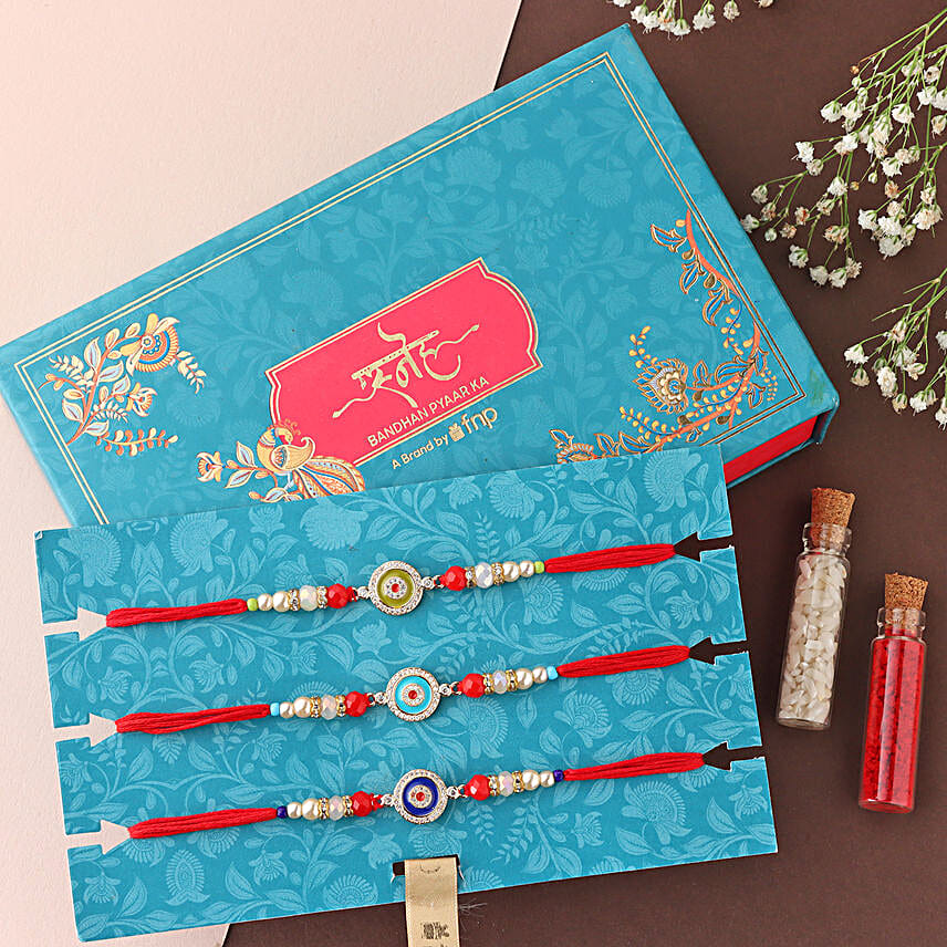 Sneh Evil Eye Rakhi Set N Haldiram Soan Papdi
