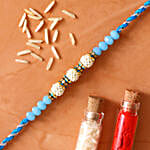 Sea Blue Pearl Designer Rakhi And Healthy Almonds