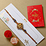 Celestial Ganesha Serenade Rakhi with Channa Barfi Combo