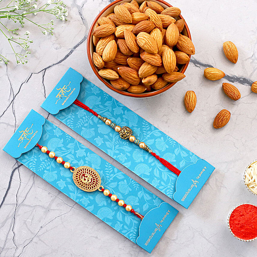 Lion Face And Auspicious Om Pearl Rakhi Set With 250 Gms Almonds