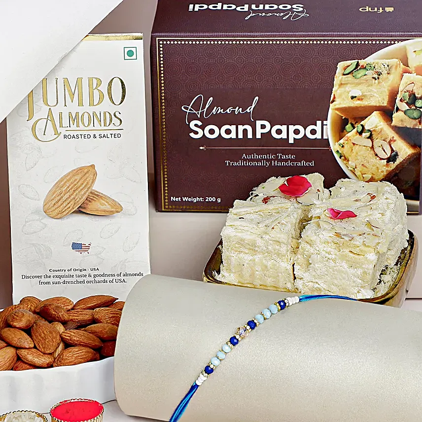 Cerulean Blue Simple Dhaga Rakhi Sweets and Nuts combo