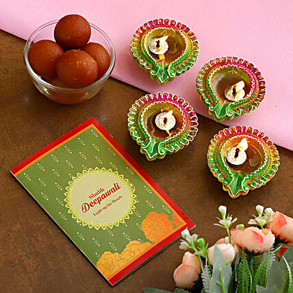 Decorative Floral Diyas With Greeting Card And Gulab Jamun:Send Diwali Gifts to New Zealand