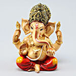 Raja Ganesha Idol With Diyas And Dried Nuts Potli
