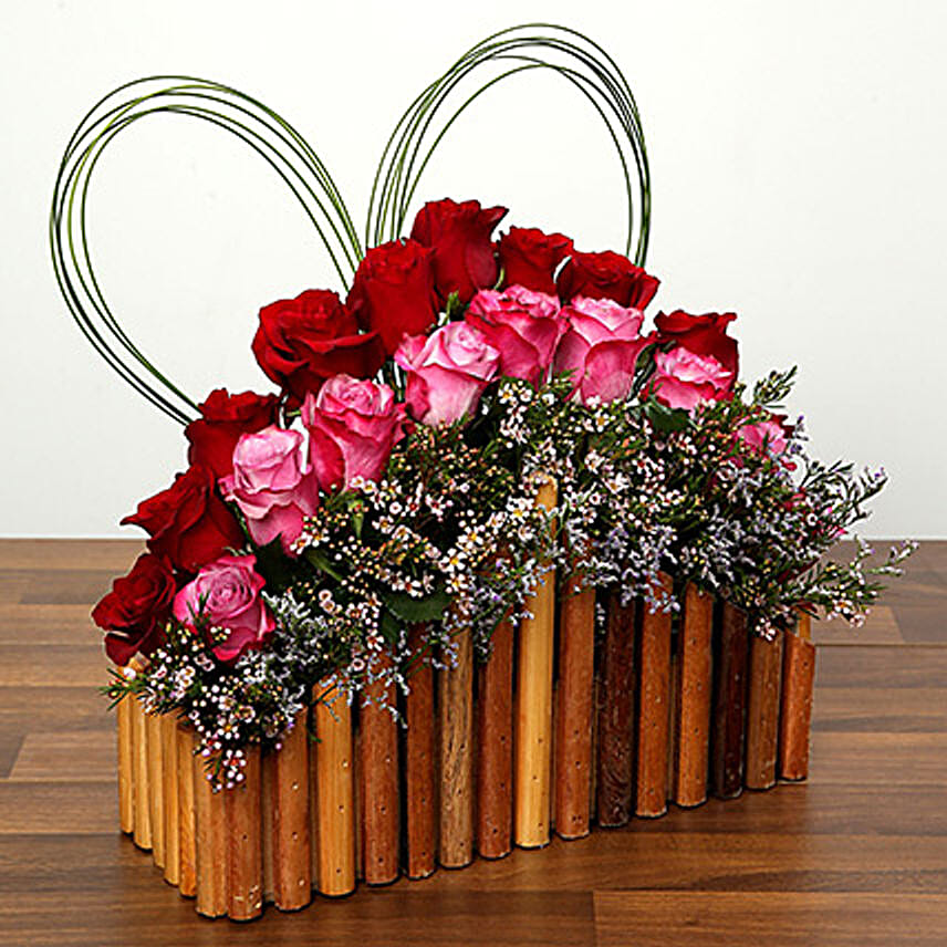 Red and Purple Roses In A Wooden Base OM