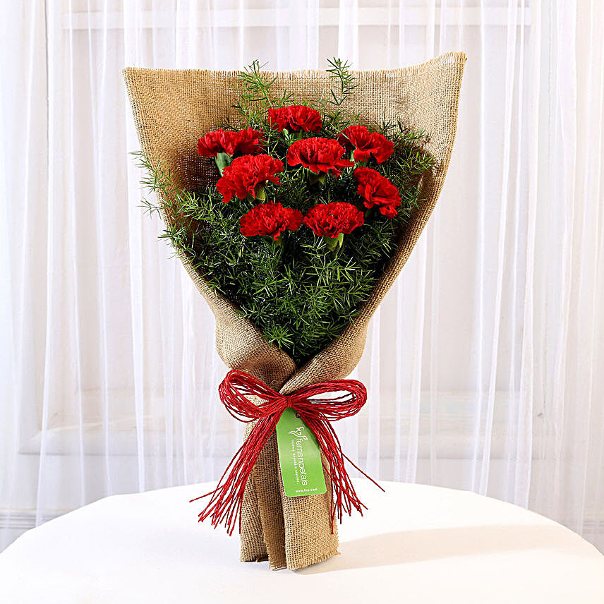 8 Red Carnations Bouquet in Jute