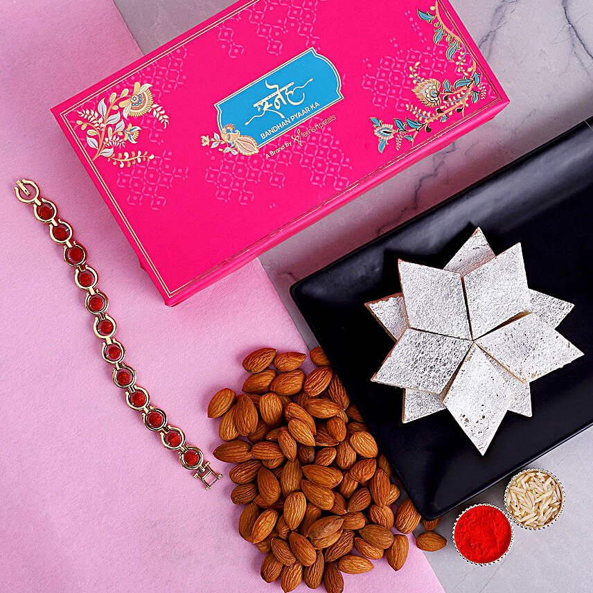 Om Rudraksha Rakhi And Almonds With Kaju Katli:Rakhi with Sweets to Philippines