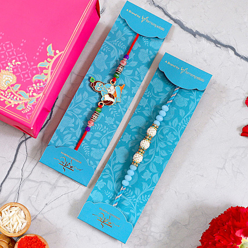 Blue Pearl And Thread Rakhi With Bal Krishna Rakhi:Set of 2 Rakhi Delivery in Philippines