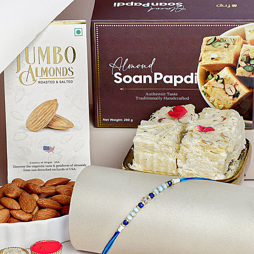 Cerulean Blue Simple Dhaga Rakhi Sweets and Nuts combo