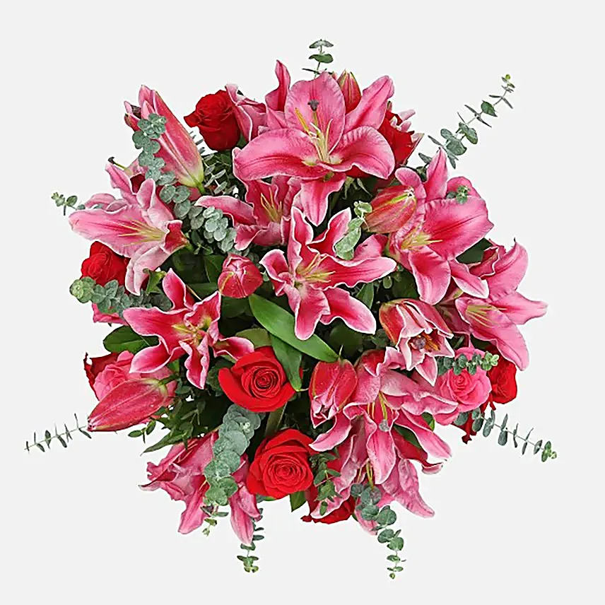 Mixed Roses Stargazer Lilies In Glass Vase Arrangement
