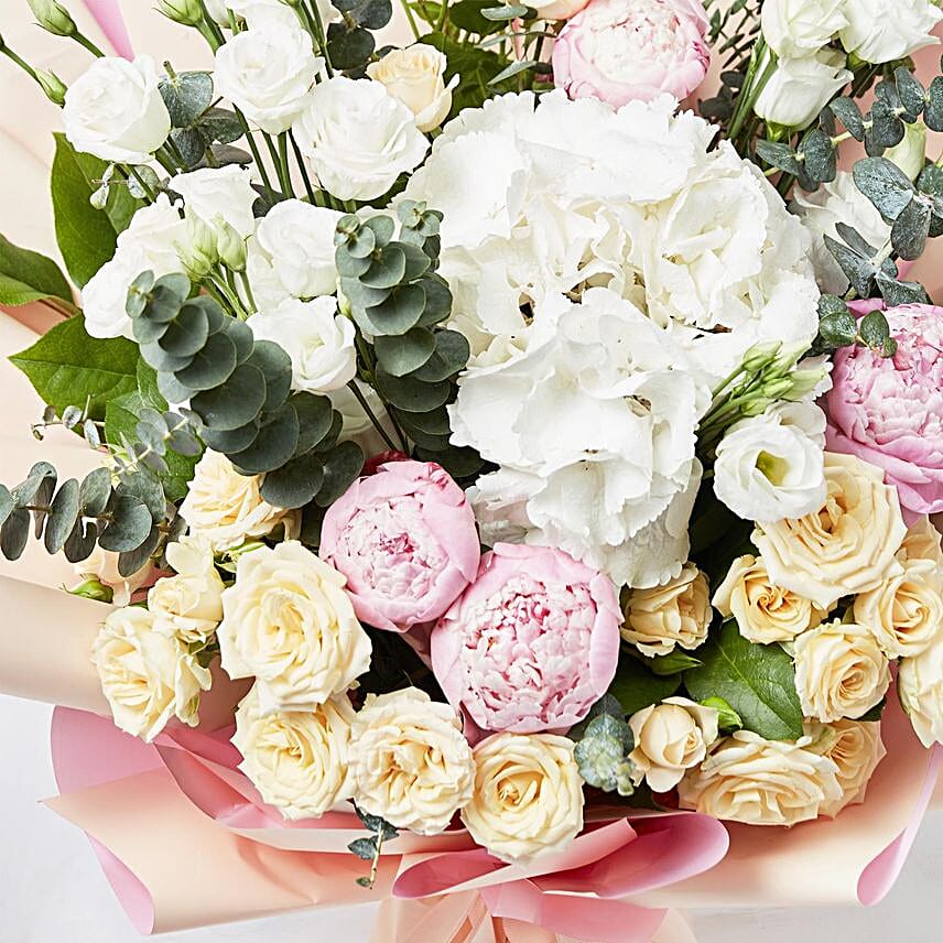 Ravishing Mixed Flowers Wrapped Bouquet