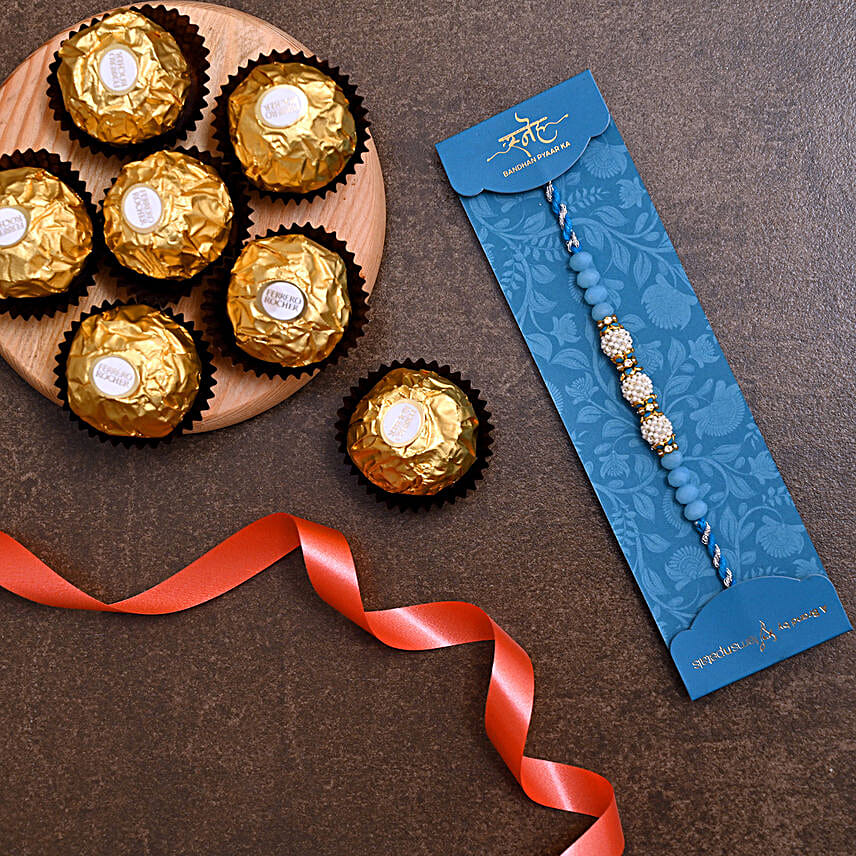 Sea Blue Pearl Designer Rakhi And 3 Pcs Ferrero Rocher