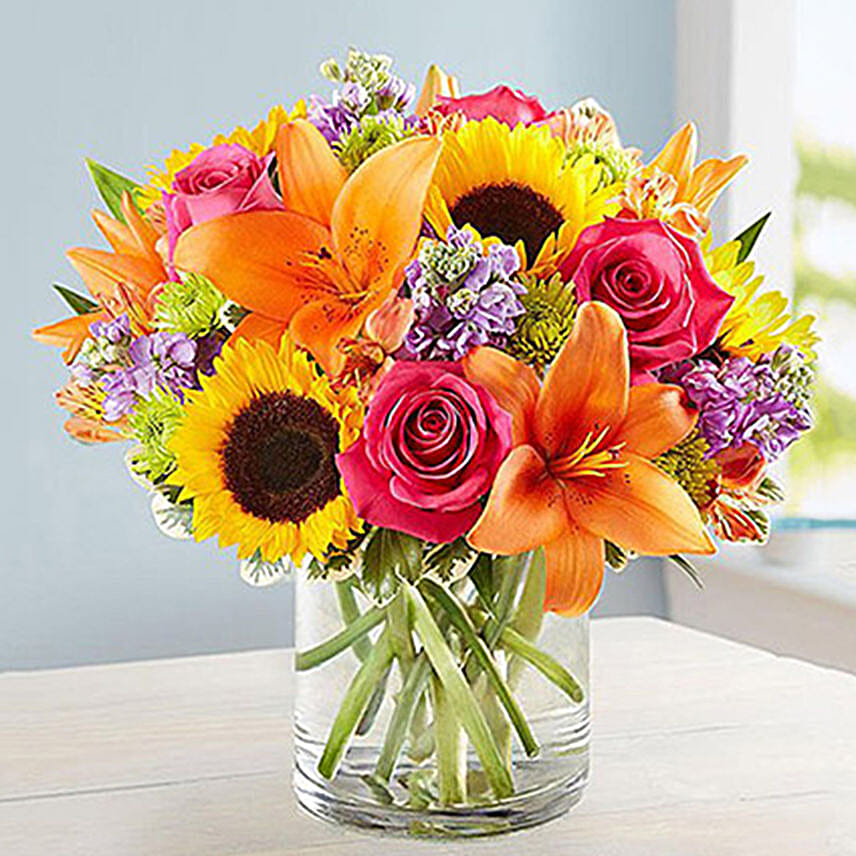 Vivid Bunch Of Flowers In Glass Vase