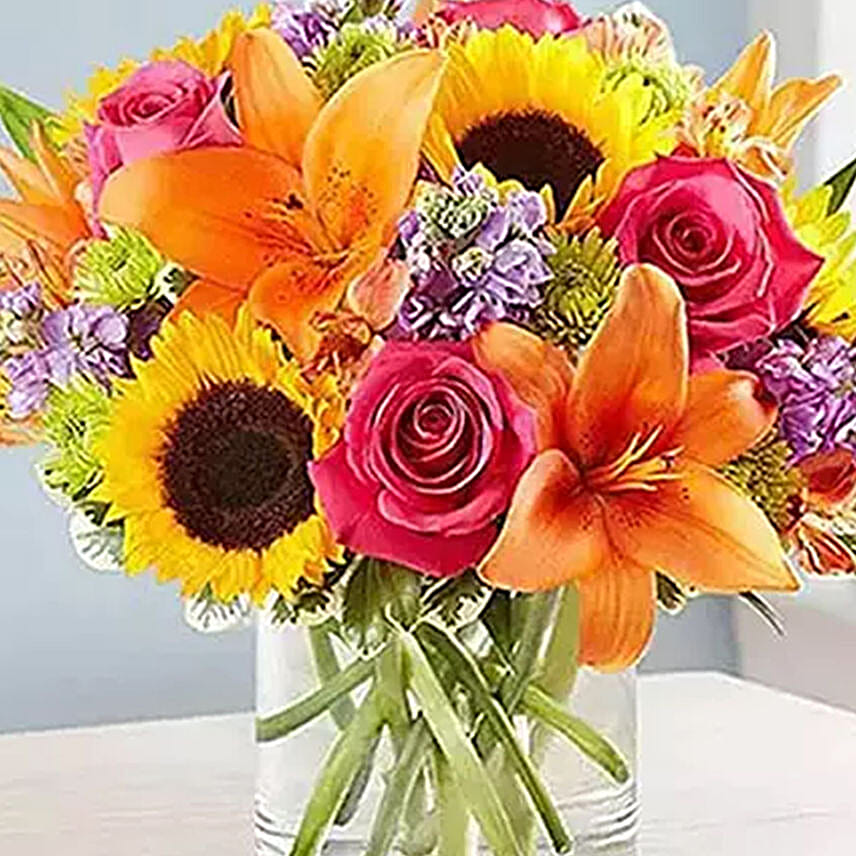 Vivid Bunch Of Flowers In Glass Vase