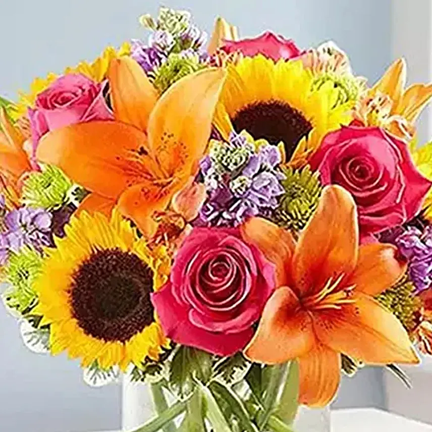 Vivid Bunch Of Flowers In Glass Vase