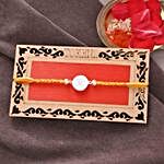 Om Silver Rakhi And Assorted Chocolates
