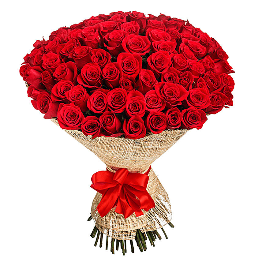 bright red roses in jute wrapped bouquet online