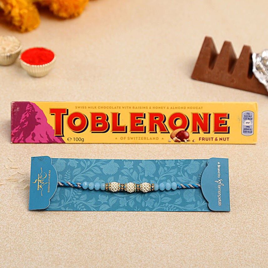 Sea Blue Pearl Designer Rakhi And Toblerone Chocolate