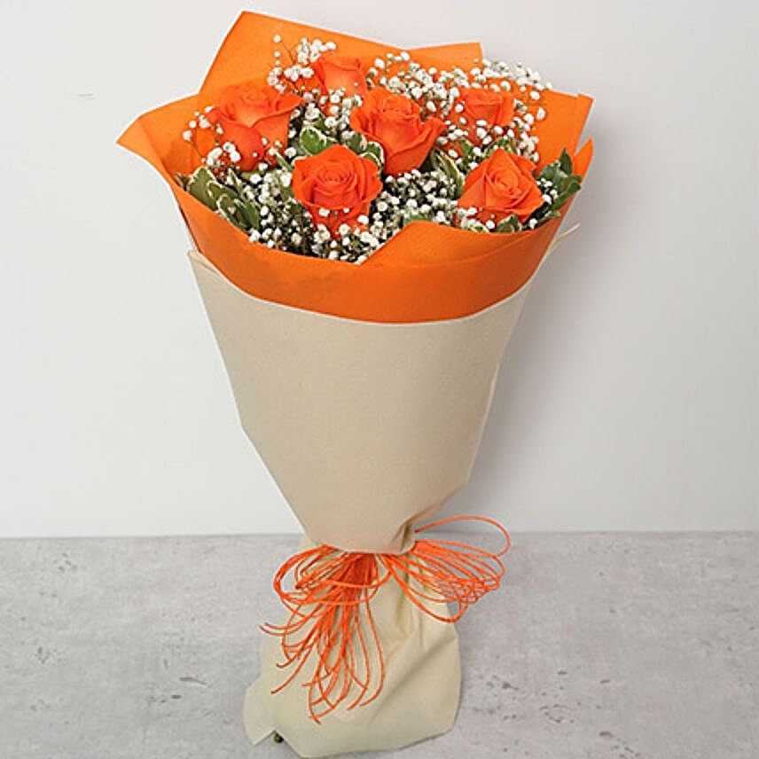 orange roses in blue wrapped:Anniversary Flower Delivery Qatar