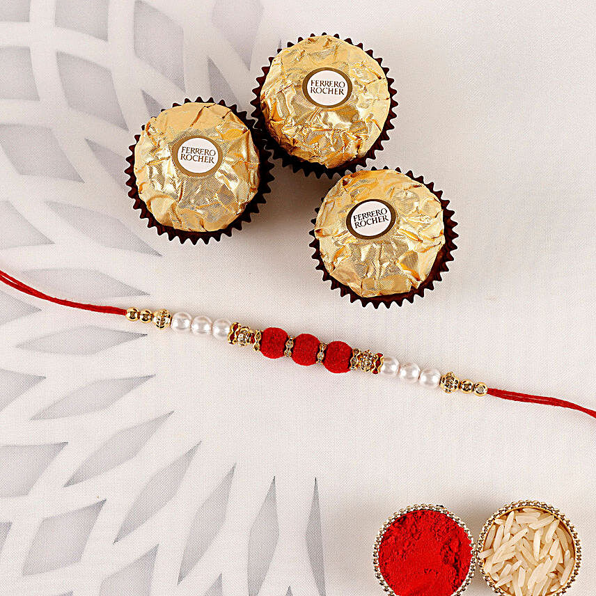Sneh White Pearl Rakhi & Ferrero Rocher:Rakhi and Chocolates to Qatar