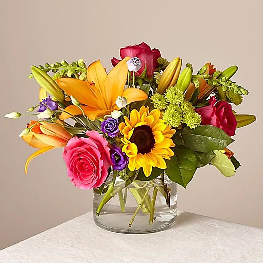 Heavenly Mixed Flowers Glass Vase:Get Well Soon Gifts to Qatar