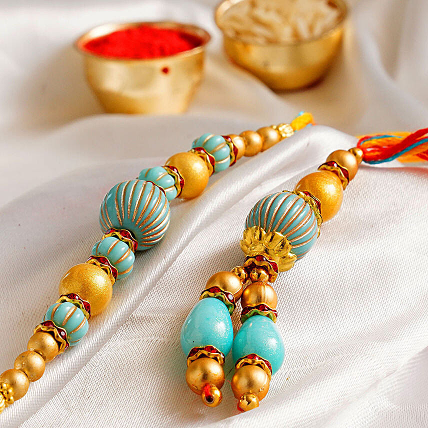 Blue Stone Rakhi Set And Soan Papdi Combo