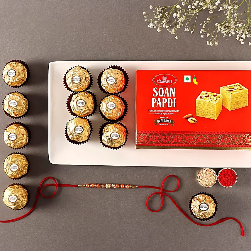 Sneh Rose Gold Rakhi With Soan Papdi & Ferrero Rocher