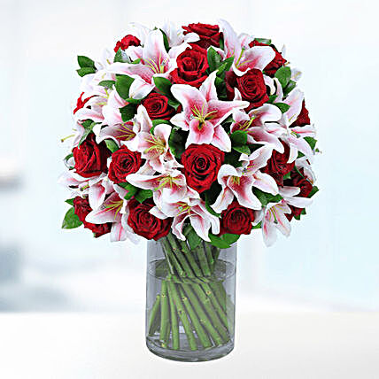 pink n roses lilies in vase arrangement online