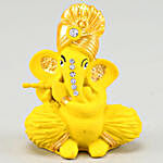Flute Ganesha Idol With Besan Burfi & Dry Fruits