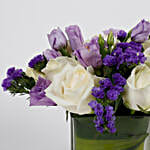 Fascinating White Roses & Purple Statice Flowers Glass Vase