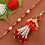 Graceful Floral Arrangement & Rakhi Set