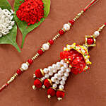 Mesmerizing Floral Arrangement & Lumba Rakhi Set