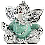 Rum & Raisins Dry Cake With Lord Ganesha Idol