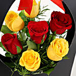 Red & Yellow Roses In FNP Sleeve Bag